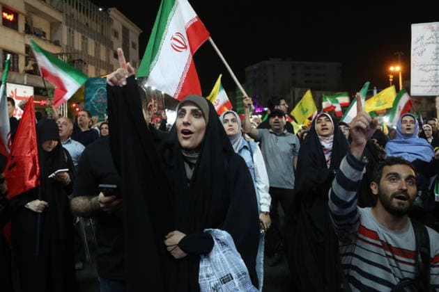 Crowds gather in Tehran to support of government following missile attack on Israel TEHRAN, IRAN - JUNE 08: ( RESTRICTIONS: NO Access Israel Media Persian Language TV Stations Outside Iran Strictly No Access BBC Persian VOA Persian Manoto TV Iran International TV ) Citizens, carrying Iranian and Hezbollah flags, gather at Enghelab Square to hold a demonstration in support of the government following Iran s missile attack on Israel, on June 08, 2026 in the capital Tehran, Iran. Fatemeh Bahrami Anadolu Tehran Iran. Editorial use only. Please get in touch for any other usage.  Copyright: x2026xAnadoluxFatemehxBahramix