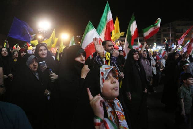 Crowds gather in Tehran to support of government following missile attack on Israel TEHRAN, IRAN - JUNE 08: ( RESTRICTIONS: NO Access Israel Media Persian Language TV Stations Outside Iran Strictly No Access BBC Persian VOA Persian Manoto TV Iran International TV ) Citizens, carrying Iranian and Hezbollah flags, gather at Enghelab Square to hold a demonstration in support of the government following Iran s missile attack on Israel, on June 08, 2026 in the capital Tehran, Iran. Fatemeh Bahrami Anadolu Tehran Iran. Editorial use only. Please get in touch for any other usage.  Copyright: x2026xAnadoluxFatemehxBahramix