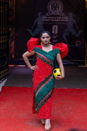 Street Fashion show ahead of the FIFA World cup in Dhaka - 07 Jun 2026 A model seen wearing a dress inspired by the colors and design of the Portugal national Football Team during the street Fashion show ahead of the FIFA World cup. Dhaka Bangladesh Copyright: xSazzadxHossainx xSOPAxImagesx Sazzad_FIFA Street Fashion Show Graffiti_FIFA worldcup (20)