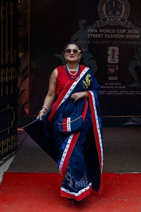Street Fashion show ahead of the FIFA World cup in Dhaka - 07 Jun 2026 A model seen wearing dress inspired by the colors and design of the France national Football Team during the street Fashion show ahead of the FIFA World cup. Dhaka Bangladesh Copyright: xSazzadxHossainx xSOPAxImagesx Sazzad_FIFA Street Fashion Show Graffiti_FIFA worldcup (24)