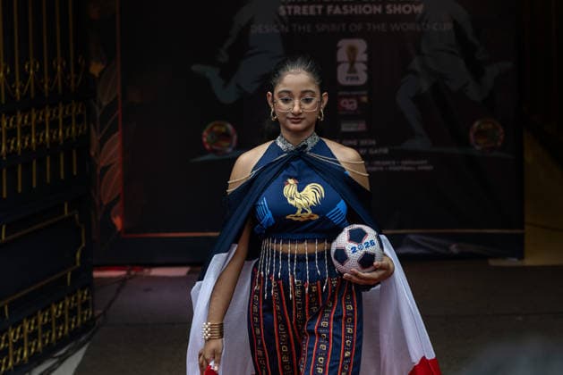 Street Fashion show ahead of the FIFA World cup in Dhaka - 07 Jun 2026 A model seen wearing dress inspired by the colors and design of the France national Football Team during the street Fashion show ahead of the FIFA World cup. Dhaka Bangladesh Copyright: xSazzadxHossainx xSOPAxImagesx Sazzad_FIFA Street Fashion Show Graffiti_FIFA worldcup (25)