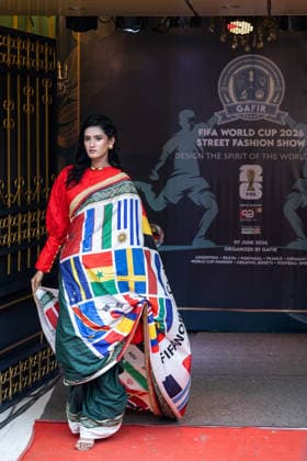 Street Fashion show ahead of the FIFA World cup in Dhaka - 07 Jun 2026 A model seen wearing a Bangladeshi Traditional Dress inspired by the colors and design of different country national flag during the street Fashion show ahead of the FIFA World cup. Dhaka Bangladesh Copyright: xSazzadxHossainx xSOPAxImagesx Sazzad_FIFA Street Fashion Show Graffiti_FIFA worldcup (40)