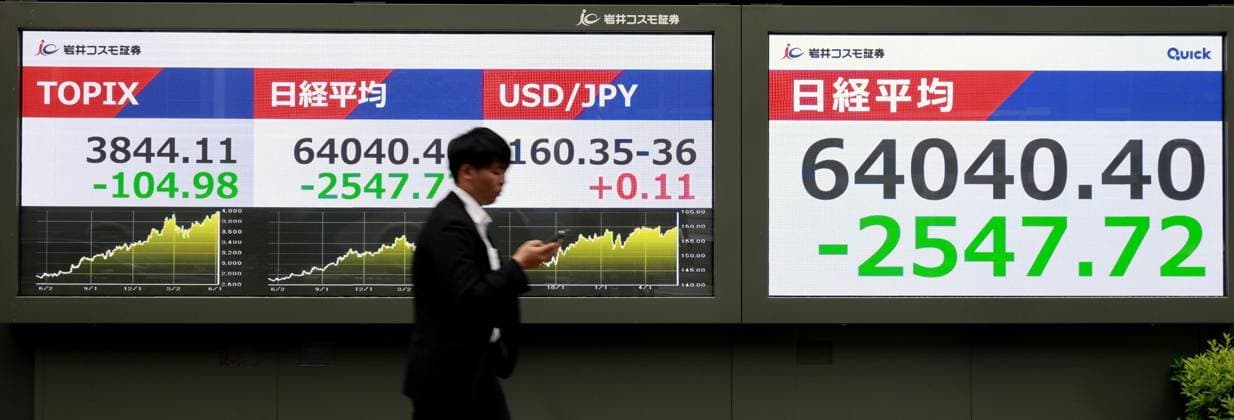 Nikkei tumbles over 3,100 points A financial data screen in Tokyo shows the 225-issue Nikkei Stock Average ending over 2,500 points lower in morning trading on June 8, 2026, after briefly tumbling over 3,100 points.  A14AA0005617935P