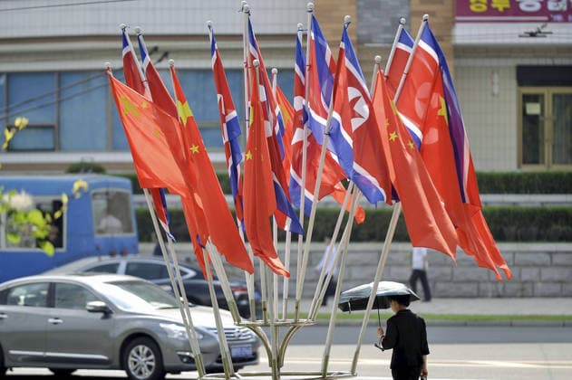 Chinese President Xi in Pyongyang Chinese and North Korean flags are hoisted in Pyongyang on June 8, 2026, as Chinese President Xi Jinping visits North Korea for the first time in seven years for a meeting with North Korean leader Kim Jong Un.  A14AA0005618018P