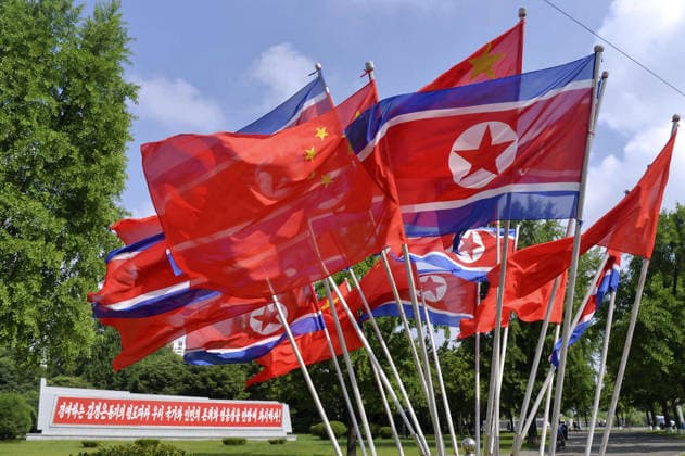 Chinese President Xi in Pyongyang Chinese and North Korean flags are hoisted in Pyongyang on June 8, 2026, as Chinese President Xi Jinping visits North Korea for the first time in seven years for a meeting with North Korean leader Kim Jong Un.  A14AA0005618019P