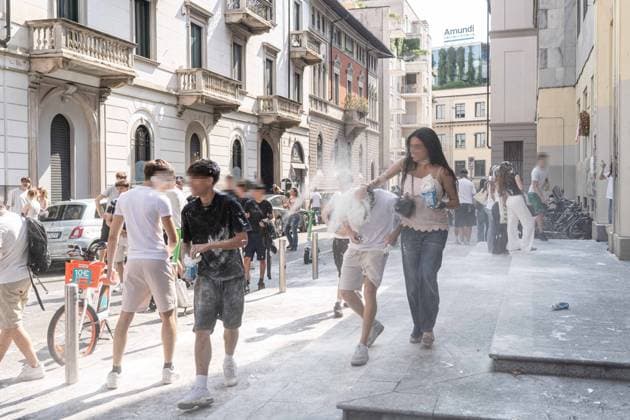 IPA85483570 - Milan, 8 6 26, Liceo Parini, last day of school, boys celebrate with foam, flour and water guns and smoke bombs.  Copyright: xGiuliaxSciaccax xGiuliaxSciaccax 85483570