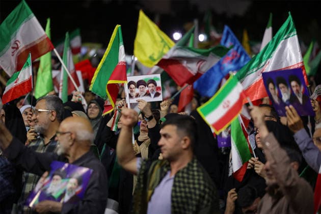June 8, 2026, Iran, Iran: Supporters wave Iranian national flags and hold portraits of founder of the Islamic Republic of Iran, Ayatollah Ruhollah Khomeini, Iran s late Supreme Leader, Ayatollah Ali Khamenei, and Iran s newly appointed Supreme Leader, Ayatollah Mojtaba Khamenei, during a state-organized rally in Iran. Air raid sirens sounded in Israel on June 7 as its military worked to intercept incoming Iranian missiles for the first time since an April ceasefire took hold in the Middle East war. IranÃ¢â‚¬â ¢s Revolutionary Guards called the attack a Ã¢â‚¬oewarningÃ¢â‚¬Â after Israel struck BeirutÃ¢â‚¬â ¢s southern suburbs earlier in the day, while Tehran said the renewed hostilities would affect ongoing peace talks with Washington. Iran - ZUMAi98_ 20260608_zih_i98_006 Copyright: xIranianxSupremexLeader SxOfficex