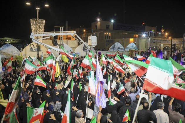 June 8, 2026, Iran, Iran: Crowds wave Iranian national flags during a state-organized rally in Iran. Air raid sirens sounded in Israel on June 7 as its military worked to intercept incoming Iranian missiles for the first time since an April ceasefire took hold in the Middle East war. IranÃ¢â‚¬â ¢s Revolutionary Guards called the attack a Ã¢â‚¬oewarningÃ¢â‚¬Â? after Israel struck BeirutÃ¢â‚¬â ¢s southern suburbs earlier in the day, while Tehran said the renewed hostilities would affect ongoing peace talks with Washington. Iran said on June 8 it was ending its latest military operation against Israel after overnight missile fire and Israeli strikes on military sites in the Islamic Republic, but warned it could deliver a more Ã¢â‚¬oecrushingÃ¢ - ZUMAi98_ 20260608_zih_i98_010 Copyright: xIranianxSupremexLeader SxOfficex