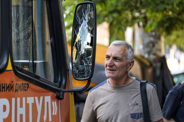 A man looks at a shared taxi damaged by a Russian drone attack, Odesa, Ukraine, June 8, 2026. Russian forces attacked the southern Ukrainian city with Shahed-type drones. The wreckage of a downed drone fell directly onto a public transport stop, damaging the stop itself, as well as a control room, and several shared taxis. Three people were injured. (Photo by Nina Liashonok Ukrinform) Russian troops attack Odesa and region with drones  Copyright: xNinaxLiashonokx