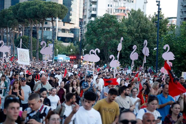 Protest against the construction of a luxury resort in Tirana, Albania. Protesters hold signs and Albanian national flags as they take part in a demonstration in front of the prime minister s office in Tirana on June 8, 2026, opposing the construction of a luxury resort in a protected natural area near the city of Vlore. Several thousand citizens demonstrated in Tirana for the ninth consecutive night to demand transparency on a luxury tourism complex project in the protected area of Narta Lagoon in the city of Vlore linked to US President Donald Trump s son-in-law Jared Kushner and his wife, Ivanka Trump. The project was planned for two areas along the Adriatic coast, the protected delta area of Vjosa-Narta and the nearby uninhabited island Copyright: xLightxStudioxAgencyx xMaltonxDibrax