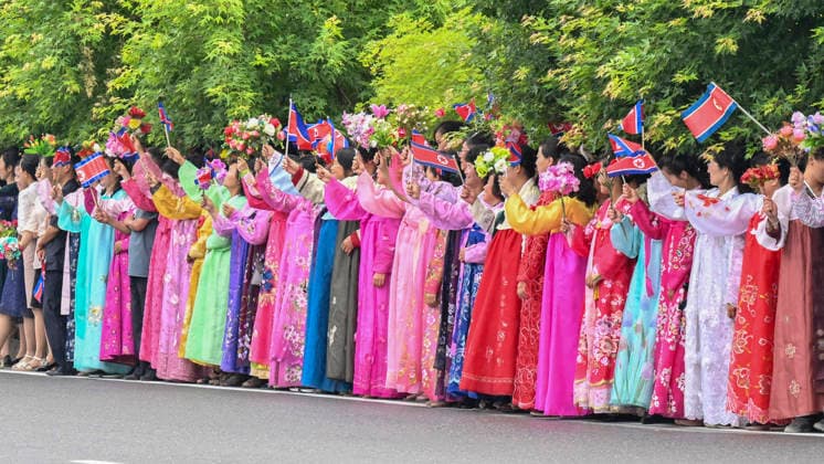 (260609) -- PYONGYANG, June 9, 2026 -- People from all walks of life bid farewell to Xi Jinping, general secretary of the Communist Party of China Central Committee and Chinese president, in Pyongyang, the Democratic People s Republic of Korea (DPRK), June 9, 2026. On Tuesday afternoon local time, Xi concluded his state visit to the DPRK and departed from Pyongyang. Kim Jong Un, general secretary of the Workers Party of Korea and president of the State Affairs of the DPRK, and his wife Ri Sol Ju went to the airport to see Xi and his wife Peng Liyuan off and held a grand farewell ceremony in their honor. ) DPRK-PYONGYANG-CHINA-XI JINPING-KIM JONG UN-GRAND FAREWELL CEREMONY ZhaixJianlan 