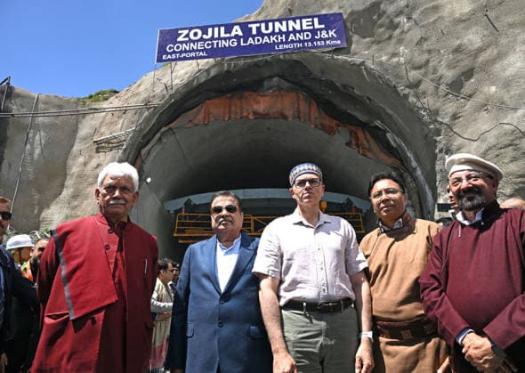 DRASS, INDIA - JUNE 9: Union Minister of Road Transport and Highways, Nitin Gadkari, with Jammu and Kashmir Lieutenant Governor Manoj Sinha and Jammu and Kashmir Chief Minister Omar Abdullah at the historic breakthrough ceremony of the Zojila Tunnel at Meenamarg on June 9, 2026 in Drass, India. Build at the cost of Rs 6000 Cr. the 13.15 KM tunnel is now the world s longest single-tube, bi-directional road tunnel at an elevation exceeding 11,500 feet. The historic breakthrough brings a decades-old national security dream closer to reality. For generations, the treacherous Zojila Pass on National Highway 1 (NH-1) has functioned as a severe logistical bottleneck, shutting down completely for three to four months during peak winter due to hea