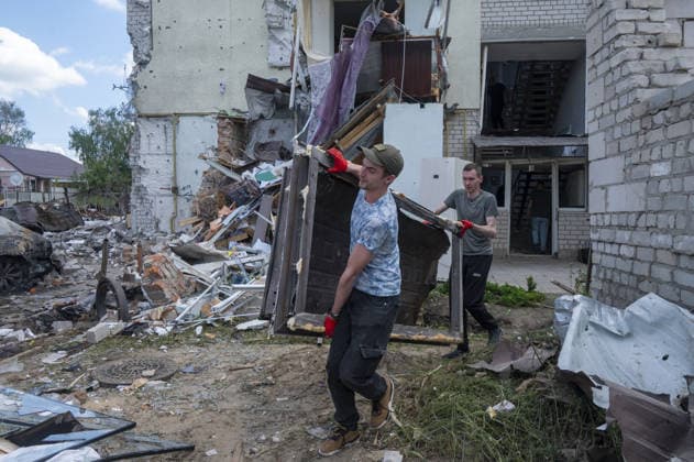 Aftermath of Russian attack on Ukraine s Chuhuiv CHUHUIV, KHARKIV REGION, UKRAINE - JUNE 9: Local residents clean the damage caused by the Russian missile strike on Chuhuiv, Kharkiv Region, Ukraine on June 9, 2026.Three people were killed in the missile attack on Chuhuiv: two men, aged 56 and 70, and a 22-year-old pregnant woman. Medical personnel provided assistance to two women, aged 71 and 65, and a 70-year-old man who suffered acute stress reactions. Two buildings, stores, garages, and two cars were damaged. Serhii Masin Anadolu Kharkiv Ukraine. Editorial use only. Please get in touch for any other usage.  Copyright: x2026xAnadoluxSerhiixMasinx