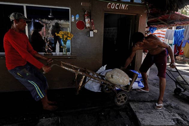 Tropical Storm Cristina hit Puerto Madero of Mexico TAPACHULA, MEXICO - JUNE 09: Men work in an area destroyed by the swell and the tropical storm Cristina in the coastal community of Puerto Madero, near Tapachula, Mexico, on Tuesday, June 09, 2026. The storm caused severe damage along the Mexican Pacific coast in the state of Chiapas, near the Guatemala border, where strong waves and storm surges impacted dozens of homes and restaurants, affecting hundreds of residents. Jose Torres Anadolu Tapachula Mexico. Editorial use only. Please get in touch for any other usage.  Copyright: x2026xAnadoluxJosexTorresx
