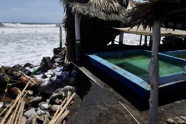 Tropical Storm Cristina hit Puerto Madero of Mexico TAPACHULA, MEXICO - JUNE 09: Destroyed walls and debris are seen in the coastal community of Puerto Madero, following the passage of Tropical Storm Cristina near Tapachula, Mexico, on Tuesday, June 09, 2026. The storm caused severe damage along the Mexican Pacific coast in the state of Chiapas, near the Guatemala border, where strong waves and storm surges impacted dozens of homes and restaurants, affecting hundreds of residents. Jose Torres Anadolu Tapachula Mexico. Editorial use only. Please get in touch for any other usage.  Copyright: x2026xAnadoluxJosexTorresx