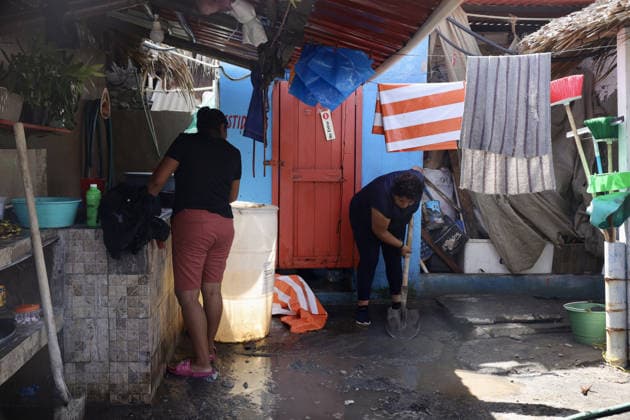 Tropical Storm Cristina hit Puerto Madero of Mexico TAPACHULA, MEXICO - JUNE 09: Two women are cleaning one of the homes damaged by the passage of Tropical Storm Cristina in the coastal community of Puerto Madero, near Tapachula, Mexico, on Tuesday, June 09, 2026. The storm caused severe damage along the Mexican Pacific coast in the state of Chiapas, near the Guatemala border, where strong waves and storm surges impacted dozens of homes and restaurants, affecting hundreds of residents. Jose Torres Anadolu Tapachula Mexico. Editorial use only. Please get in touch for any other usage.  Copyright: x2026xAnadoluxJosexTorresx