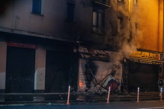 June 9, 2026, Belfast, Antrim, United Kingdom: A burnt out shop that is owned by an immigrant seen after an anti-immigration protest. Belfast erupted into flames as locals took to the streets to protest against the stabbing of a North Belfast man by a Sudanese national refugee. Road blockades were set up all over Belfast bringing much of the city to a standstill. The protestors are demanding a stop to immigration into Northern Ireland. Belfast United Kingdom - ZUMAs197 20260609_aaa_s197_272 Copyright: xLabxMox