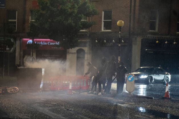 June 9, 2026, Belfast, Antrim, United Kingdom: Youths block a road during the demonstration. Belfast erupted into flames as locals took to the streets to protest against the stabbing of a North Belfast man by a Sudanese national refugee. Road blockades were set up all over Belfast bringing much of the city to a standstill. The protestors are demanding a stop to immigration into Northern Ireland. Belfast United Kingdom - ZUMAs197 20260609_aaa_s197_290 Copyright: xLabxMox