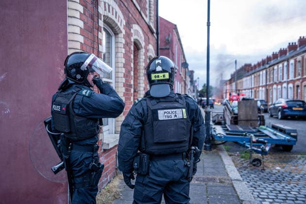 June 9, 2026, Belfast, Antrim, United Kingdom: Riot Police arrive at the scene of a fire lit by protestors in Belfast. Belfast erupted into flames as locals took to the streets to protest against the stabbing of a North Belfast man by a Sudanese national refugee. Road blockades were set up all over Belfast bringing much of the city to a standstill. The protestors are demanding a stop to immigration into Northern Ireland. Belfast United Kingdom - ZUMAs197 20260609_aaa_s197_291 Copyright: xLabxMox