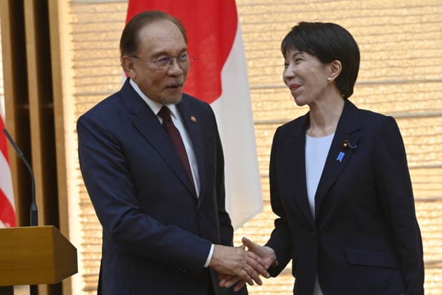 Japan - Malaysia Diplomacy TOKYO, JAPAN - JUNE 10: Japanese Prime Minister Sanae Takaichi (R) and Prime Minister Anwar Ibrahim (L) shake hands at the end a joint press announcement following their bilateral meeting at the Prime Minister’s Office in Tokyo, Japan, on June 10, 2026. Malaysian Prime Minister Anwar Ibrahim is on a three-day official visit to Japan aimed at securing natural gas supplies, accelerating the energy transition and strengthening bilateral defence agreements. David Mareuil Anadolu Tokyo Japan. Editorial use only. Please get in touch for any other usage.  Copyright: x2026xAnadoluxDavidxMareuilx