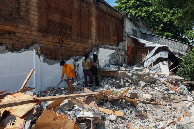 Nearly 88,000 affected by 7.8-magnitude quake, 22,690 remain displaced in Southern Philippines GENERAL SANTOS, PHILIPPINES – JUNE 10: Displaced residents search for salvageable belongings in the debris of their collapsed home following a deadly earthquake in General Santos, Philippines, on June 10, 2026. Nearly 88,000 people across southern Mindanao have been affected by a magnitude 7.8 earthquake that struck southern Philippines on June 8, while more than 22,000 remain displaced as aftershocks continue, according to government and NGO figures. The quake has killed dozens of people, damaged infrastructure and homes, and caused residential buildings and poorly constructed houses to collapse, making it the strongest earthquake to hit the disa  Copyright: x2026xAnadoluxDanielxCengx