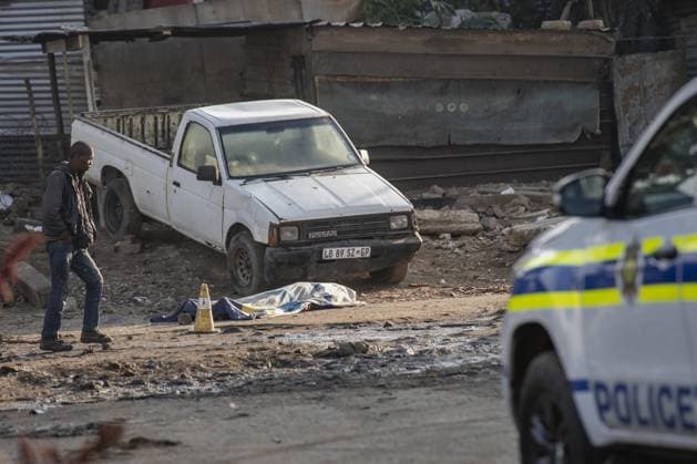 12 killed in shooting in South Africa JOHANNESBURG, SOUTH AFRICA - JUNE 10: The body of one of the victims is seen at the scene where at least 12 people were killed and nine others injured in a shooting at the informal settlement of Jumpers in the Cleveland area of Johannesburg, South Africa, on June 10, 2026. Security forces were deployed to the scene following the attack. Ihsaan Haffejee Anadolu Johannesburg South Africa. Editorial use only. Please get in touch for any other usage.  Copyright: x2026xAnadoluxIhsaanxHaffejeex