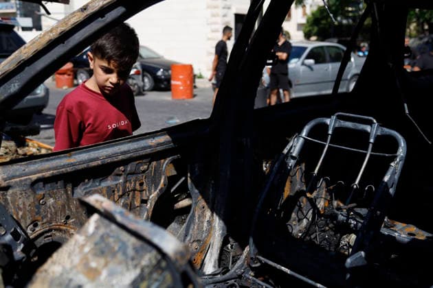 June 10, 2026, Saida, Saidon District, lebanon: An Israeli drone strike targeted a van in the Al-Bawaba Al-Fawqa area adjacent to the commercial market in central Sidon (Saida), southern Lebanon, killing two people and igniting a fire that spread to several nearby vehicles. The attack occurred near the Maronite Church and a fuel station in a densely populated civilian area. Emergency responders and civil defense teams recovered the victims and worked to extinguish the blaze, which damaged at least four neighboring cars. Saida lebanon - ZUMAb339 20260610_znp_b339_004 Copyright: xAbdulxKaderxAlxBayx