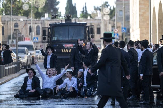 Police intervene as Ultra-Orthodox Jews block roads in West Jerusalem WEST JERUSALEM - JUNE 10: Israeli police use stun grenades and water cannons to disperse Ultra-Orthodox (Haredi) Jews blocking roads during a protest on June 10, 2026. Three demonstrators were detained during the incidents in West Jerusalem, where crowds gathered to protest against compulsory military service. Mostafa Alkharouf Anadolu Jerusalem Israel. Editorial use only. Please get in touch for any other usage.  Copyright: x2026xAnadoluxMostafaxAlkharoufx