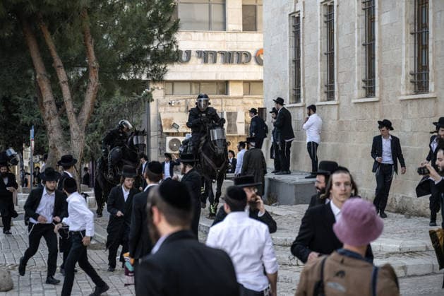Police intervene as Ultra-Orthodox Jews block roads in West Jerusalem WEST JERUSALEM - JUNE 10: Israeli police intervene to disperse Ultra-Orthodox (Haredi) Jews blocking roads during a protest on June 10, 2026. Three demonstrators were detained during the incidents in West Jerusalem, where crowds gathered to protest against compulsory military service. Mostafa Alkharouf Anadolu Jerusalem Israel. Editorial use only. Please get in touch for any other usage.  Copyright: x2026xAnadoluxMostafaxAlkharoufx