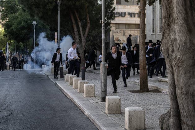 Police intervene as Ultra-Orthodox Jews block roads in West Jerusalem WEST JERUSALEM - JUNE 10: Israeli police use stun grenades and water cannons to disperse Ultra-Orthodox (Haredi) Jews blocking roads during a protest on June 10, 2026. Three demonstrators were detained during the incidents in West Jerusalem, where crowds gathered to protest against compulsory military service. Mostafa Alkharouf Anadolu Jerusalem Israel. Editorial use only. Please get in touch for any other usage.  Copyright: x2026xAnadoluxMostafaxAlkharoufx