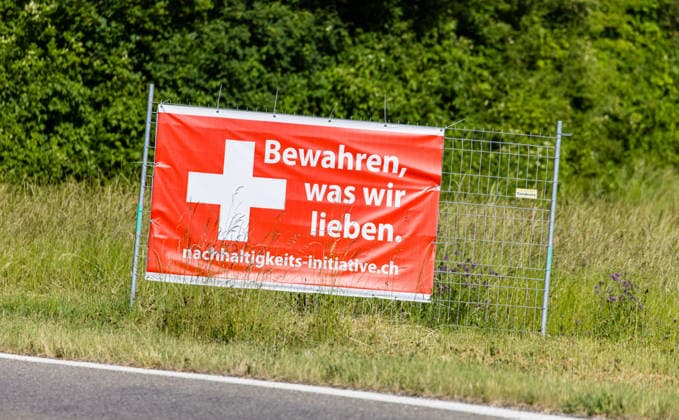 SVP voting poster for the sustainability initiative 2026 Hornussen, Switzerland, 30th May 2026: A campaign poster from the Swiss People s Party (SVP) for the sustainability initiative. The poster reads: Preserve what we love. The Swiss electorate will vote on the popular initiative on June 14, 2026. *** SVP voting poster for the sustainability initiative 2026 Hornussen, Switzerland, 30th May 2026 A campaign poster from the Swiss People s Party SVP for the sustainability initiative The poster reads Preserve what we love The Swiss electorate will vote on the popular initiative on June 14, 2026 Copyright: xAndreasxHaasx