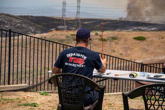 June 10, 2026, Oceanside, California, USA: Fire crews battle the November Fire off Foussat Rd. in Oceanside, California, on June 10, 2026. Multiple resources were called to subdue the nearly 850 acre fire that borders Camp Pendleton and the Whelan Lake Audubon Society Preserve. Oceanside USA - ZUMAg219 20260610_znp_g219_007 Copyright: xJakexLeexGreenx