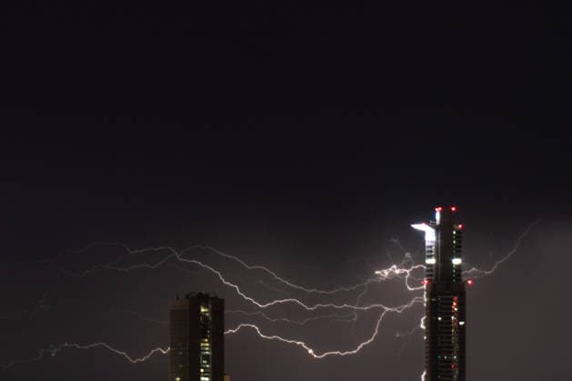 June 10, 2026, Frankfurt, Hesse, Germany: Lightning strikes behind part of the financial district skyline during a thunderstorm in Frankfurt am Main, Germany. Frankfurt Germany - ZUMAb332 20260610_zip_b332_012 Copyright: xMatiasxBasualdox
