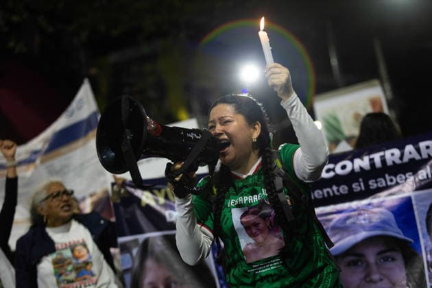 June 10, 2026, Mexico City, Mexico: Relatives of missing persons and search collectives took part in the Light Up the Search march from the rail station to the Banorte Stadium in Mexico City. The mobilization was part of a series of protests and actions organized in the context of the opening of the 2026 FIFA World Cup to draw attention to Mexico s disappearance crisis and demand truth, justice and effective search mechanisms. Mexico City Mexico - ZUMAl178 20260610_znp_l178_034 Copyright: xCristianxLeyvax