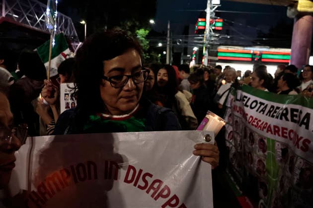 June 10, 2026, Mexico City, Cdmx, Mexico: Hours before the opening of the 2026 FIFA World Cup at Mexico City Stadium, hundreds of mothers, search collectives, and relatives of disappeared persons marched to try to reach the stadium. This proved impossible, as the government of Clara Brugada has spent several days erecting metal barriers and deploying hundreds of police officers a mile away from the stadium. Families of victims of enforced disappearance chanted slogans demanding that Mayor Claudia Sheinbaum acknowledge that there is a budget to host a large-scale sporting event, but no resources to search for the more than 133,000 disappeared persons. They argued that these families are doing the work of the Attorney General s Offices becaus - ZUMAp204 20260610_zip_p204_080 Copyright: xJosuexPerezx