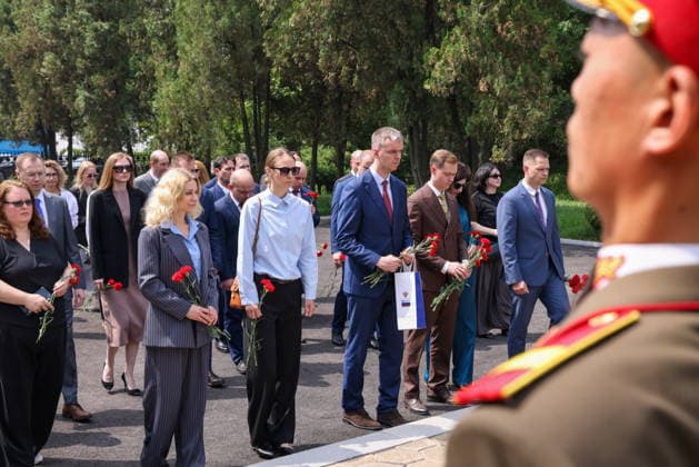NORTH KOREA, PYONGYANG - JUNE 11, 2026: Staff members of Russian institutions attend a wreath laying ceremony at the Liberation Monument marking the upcoming Russia Day. Stanislav Varivoda TASS  93653382