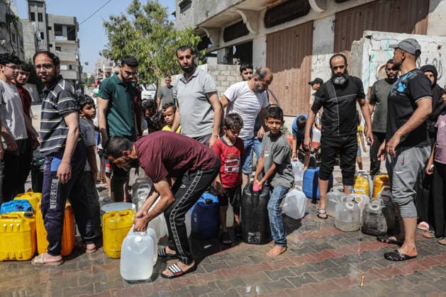Displaced Palestinians queue for water in central Gaza Displaced Palestinians gather to collect drinking water and water for daily use from a mobile distribution truck in the Bureij refugee camp in the central Gaza Strip on June 11, 2026. Palestinians in Gaza face a severe shortage of drinking and household water as wells and water facilities remain disrupted due to shortages of fuel and spare parts, forcing residents to wait for hours and travel long distances to obtain limited supplies amid rising temperatures and increased demand during the summer season. Photo by Moiz Salhi apaimages Nusairat Gaza Strip Palestinian Territory 110626_Bureij_MS_00(10) Copyright: xapaimagesxMoizxSalhixx xapaimagesx