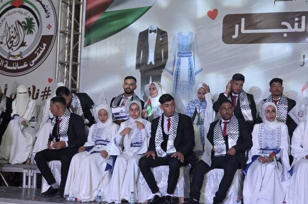 Mass wedding brings hope to displaced couples in Gaza Palestinian brides and grooms take part in the collective wedding ceremony Window of Hope in Khan Younis, southern Gaza Strip, on June 11, 2026. The event brought together dozens of displaced couples from the town of Khuza a, east of Khan Younis, as part of an initiative aimed at supporting newlyweds, easing social and economic burdens, and highlighting the community’s efforts to preserve moments of joy despite ongoing hardship. Photo by Tariq Mohammad APA Images Khan Yunis Gaza Strip Palestinian Territory 110626_Khan_Yunis_TM_01(16) Copyright: xapaimagesxTariqxMohammad xapaimagesx
