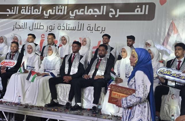 Mass wedding brings hope to displaced couples in Gaza Palestinian brides and grooms take part in the collective wedding ceremony Window of Hope in Khan Younis, southern Gaza Strip, on June 11, 2026. The event brought together dozens of displaced couples from the town of Khuza a, east of Khan Younis, as part of an initiative aimed at supporting newlyweds, easing social and economic burdens, and highlighting the community’s efforts to preserve moments of joy despite ongoing hardship. Photo by Tariq Mohammad APA Images Khan Yunis Gaza Strip Palestinian Territory 110626_Khan_Yunis_TM_01(12) Copyright: xapaimagesxTariqxMohammad xapaimagesx