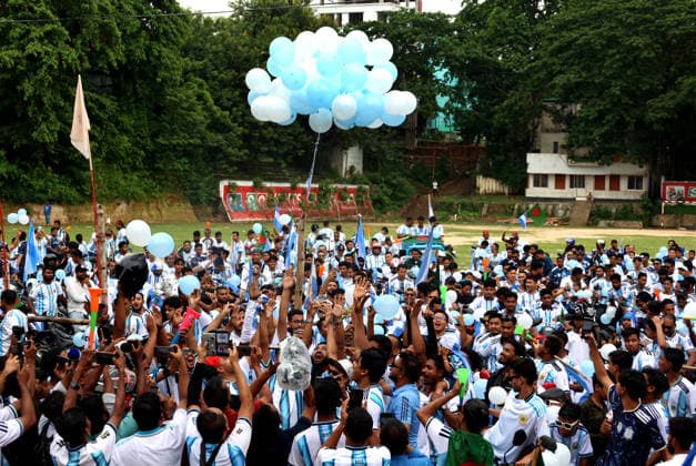 June 11, 2026, Rangamati, Rangamati Hill Tracts, Bangladesh: Welcoming the Greatest Show on Earth , the FIFA World Cup 2026, passionate fans and supporters of Argentina held a massive showdown and colorful rally in the scenic hill town of Rangamati. Hundreds of Albiceleste fans joined the celebration to express their deep love and excitement for their favorite team.................The grand rally kicked off from the Reserve Bazar area of Rangamati town. Wearing the iconic sky blue and white jerseys, ecstatic fans waved both the national flag of Bangladesh and the flag of Argentina, filling the air with music, dances, slogans, and joyous cheers.................A massive convoy comprising motorcycles, CNG-run autorickshaws, trucks, and mini- - ZUMAs308 20260611_zip_s308_008 Copyright: xMohammedxShajahanx