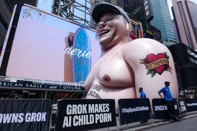 New York, NY- June 11th: A Giant Inflatable Sculpture of Elon Musk in Times Square Manhattan on June 11, displays the statement Ã¢â‚¬oeSpace XÃ¢â‚¬â ¢s Grok Makes AI Child PornÃ¢â‚¬Â.on June 11, 2026 Credit: Camara Porter USA - ZUMAa123 20260611_zaa_a123_018 Copyright: xAdMediax