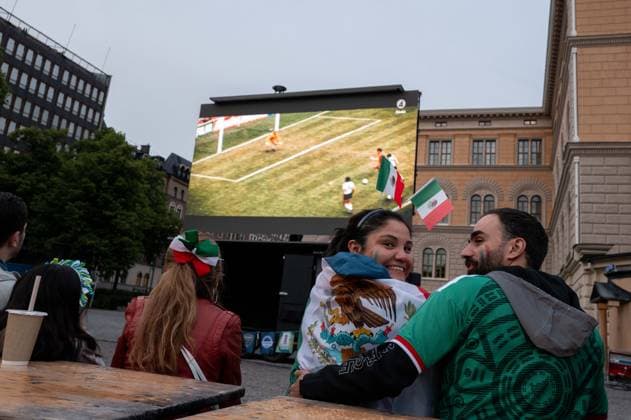 June 11, 2026, Stockholm, Stockholm County, Sweden: Football fans gather in central Stockholm, Sweden, on June 11, 2026, to watch the opening match of the 2026 FIFA World Cup between Mexico and South Africa. Members of the Mexican diaspora and other supporters attended the public viewing event organized by the Mexican Embassy in Sweden, creating a festive atmosphere ahead of the tournament opener. Stockholm Sweden - ZUMAa136 20260611_zap_a136_001 Copyright: xJoelxLindhex