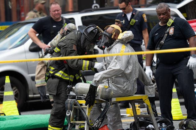 June 11, 2026, Washington, Dc, United States: Washington, D.C. fire fighters are decontaminated following a suspcious package incident near the Foggy Bottom Metro station in Washington, D.C. on June 11, 2026. Washington United States  - ZUMAl312 20260611_znp_l312_047 Copyright: xAndrewxLeydenx
