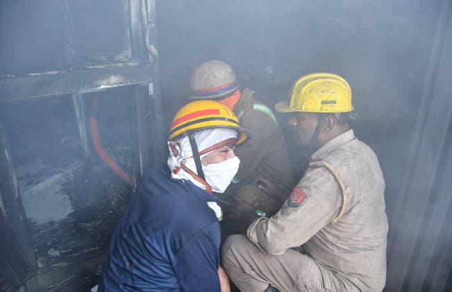 GHAZIABAD, INDIA - JUNE 11: Firefighters battle toxic, suffocating plumes of dense black smoke after massive blaze that erupted at a chemical factory in Hindon Vihar near Nandgram on June 11, 2026 in Ghaziabad, India. (Photo by Sakib Ali Hindustan Times) Massive Fire Broke Out At A Chemical Factory In Ghaziabad