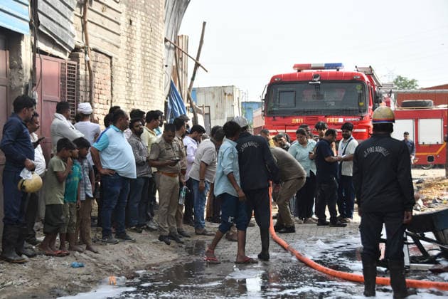 GHAZIABAD, INDIA - JUNE 11: Onlookers watch as firefighters battle fire that erupted at a chemical factory in Hindon Vihar near Nandgram on June 11, 2026 in Ghaziabad, India. (Photo by Sakib Ali Hindustan Times) Massive Fire Broke Out At A Chemical Factory In Ghaziabad