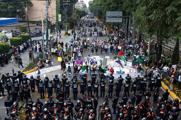 June 11, 2026, Mexico City, Mexico: Demonstrators took part in protests outside Mexico City Stadium in Mexico City on the opening day of the 2026 FIFA World Cup. The demonstration led to clashes with security personnel near the venue as part of a series of actions organized to highlight social demands, including concerns related to Mexico s disappearance crisis. Mexico City Mexico - ZUMAl178 20260611_znp_l178_037 Copyright: xCristianxLeyvax