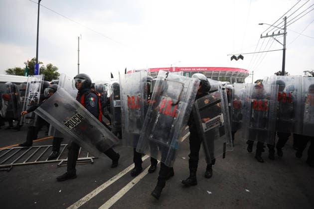 Demonstrators clash with police during the World Cup opener in Mexico City MEXICO CITY, MEXICO - JUNE 11: Riot police use shields to protect themselves during clashes with demonstrators near Banorte Stadium, in Mexico City, Mexico on June 11, 2026. Thousands of demonstrators marched toward Banorte Stadium to protest against the World Cup, while some clashed with riot police outside the stadium where the World Cup opener was taking place. Daniel Cardenas Anadolu Mexico City Mexico. Editorial use only. Please get in touch for any other usage.  Copyright: x2026xAnadoluxDanielxCardenasx