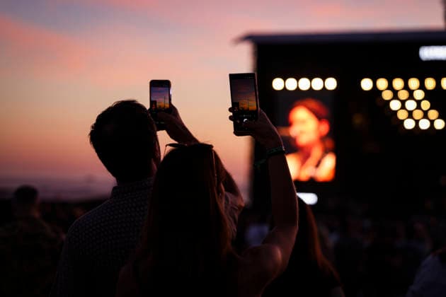 June 11, 2026, Porto, Portugal: People take photos during the concert as the sun sets on the first day of the Primavera Sound festival. Porto Portugal - ZUMAs197 20260611_aaa_s197_095 Copyright: xRitaxFrancax
