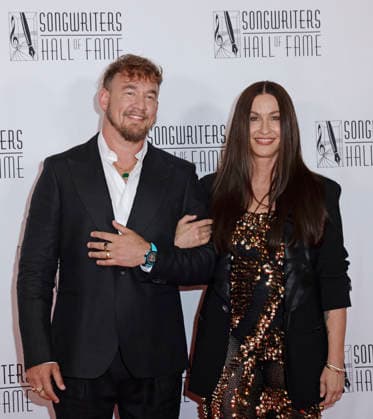 Singer-songwriter Alanis Morissette, right and Mario Souleye Treadway arrive on the red carpet at the 2026 Songwriters Hall of Fame Induction and Awards Gala at the New York Marriott Marquis on Thursday, June 11, 2026 in New York City.  NYP2026061120125 PETERxFOLEY