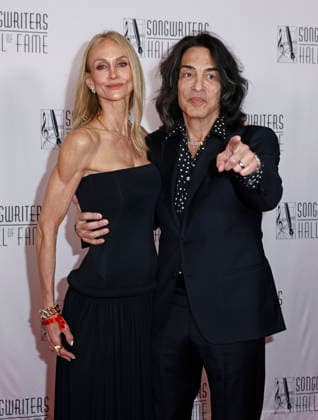 Singer-songwriter Paul Stanley, right and Erin Sutton arrive on the red carpet at the 2026 Songwriters Hall of Fame Induction and Awards Gala at the New York Marriott Marquis on Thursday, June 11, 2026 in New York City.  NYP202606112027 PETERxFOLEY